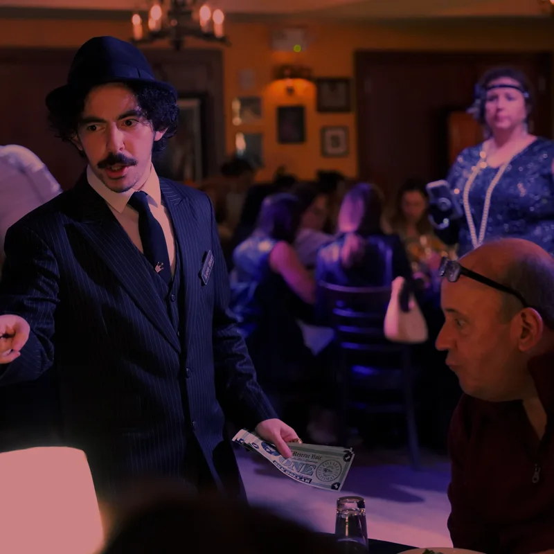 A detective questioning a guest at a Minneapolis show